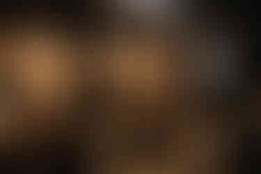 Guests enjoy cocktail hour at historic and industrial venue. 