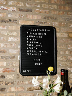 Vintage bar sign with drink list.