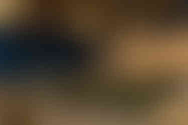 Fall-themed reception dinner beneath chandeliers.