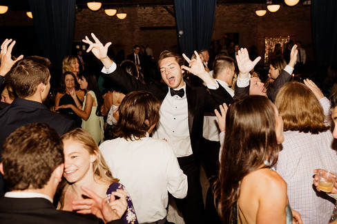 Groom enjoying dance party