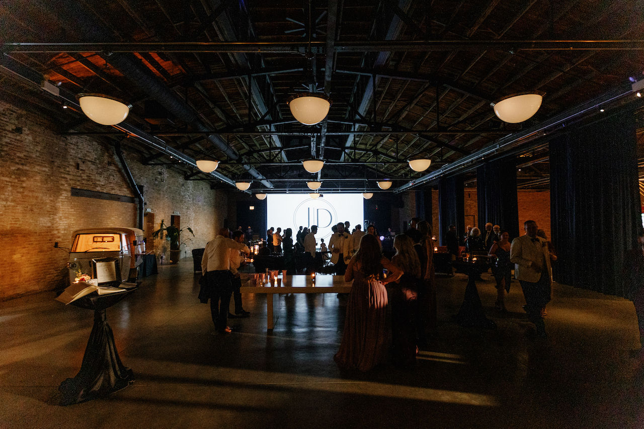 Evening reception overview with beer pong and monogram screen at Wildman BT.