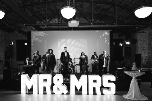 Neon Mr and Mrs signage at loft wedding.