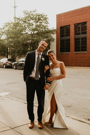 Elegant bride and groom in venue surroundings 