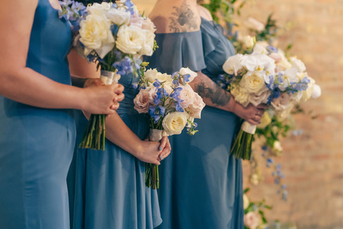 Juliet Tan bridesmaids pastel bouqets.