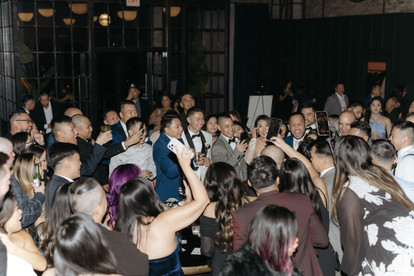 Guests get the party going at industrial venue.