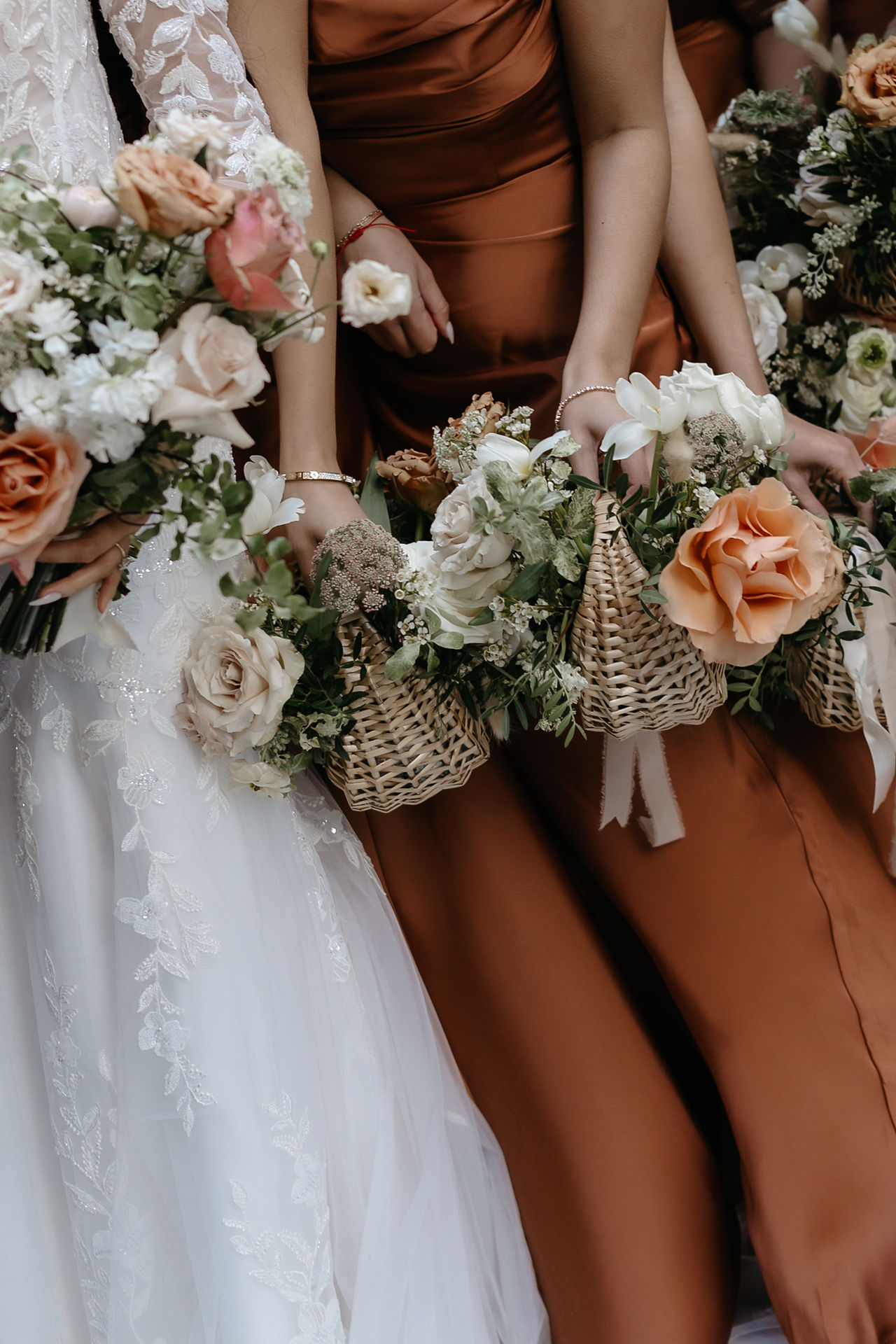 Cresco Stems floral bridal party bouquets with copper accents.