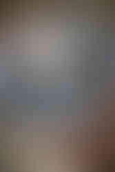 Custom vinyl record wedding guest book with handwritten messages and couple portrait.