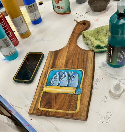 art cafe studio open class wood cutting charcuterie board painting at the prairie arts center in north platte nebraska