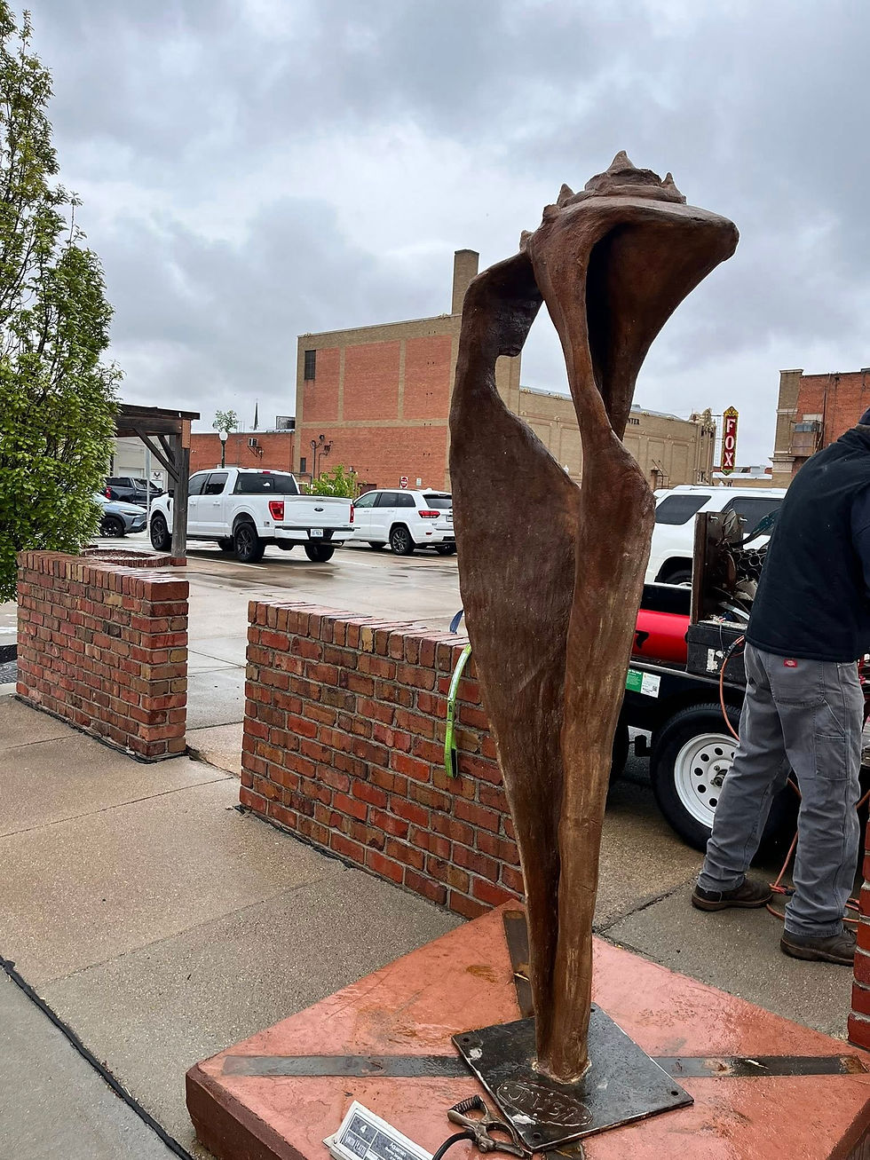 The beauty in the broken sculpture by joe and terry malesky on display at the Prairie Arts Center in North Platte Nebraska