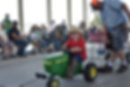 kid riding on tractor at the kids tractor pull event during the lincoln county fair in north platte nebraska