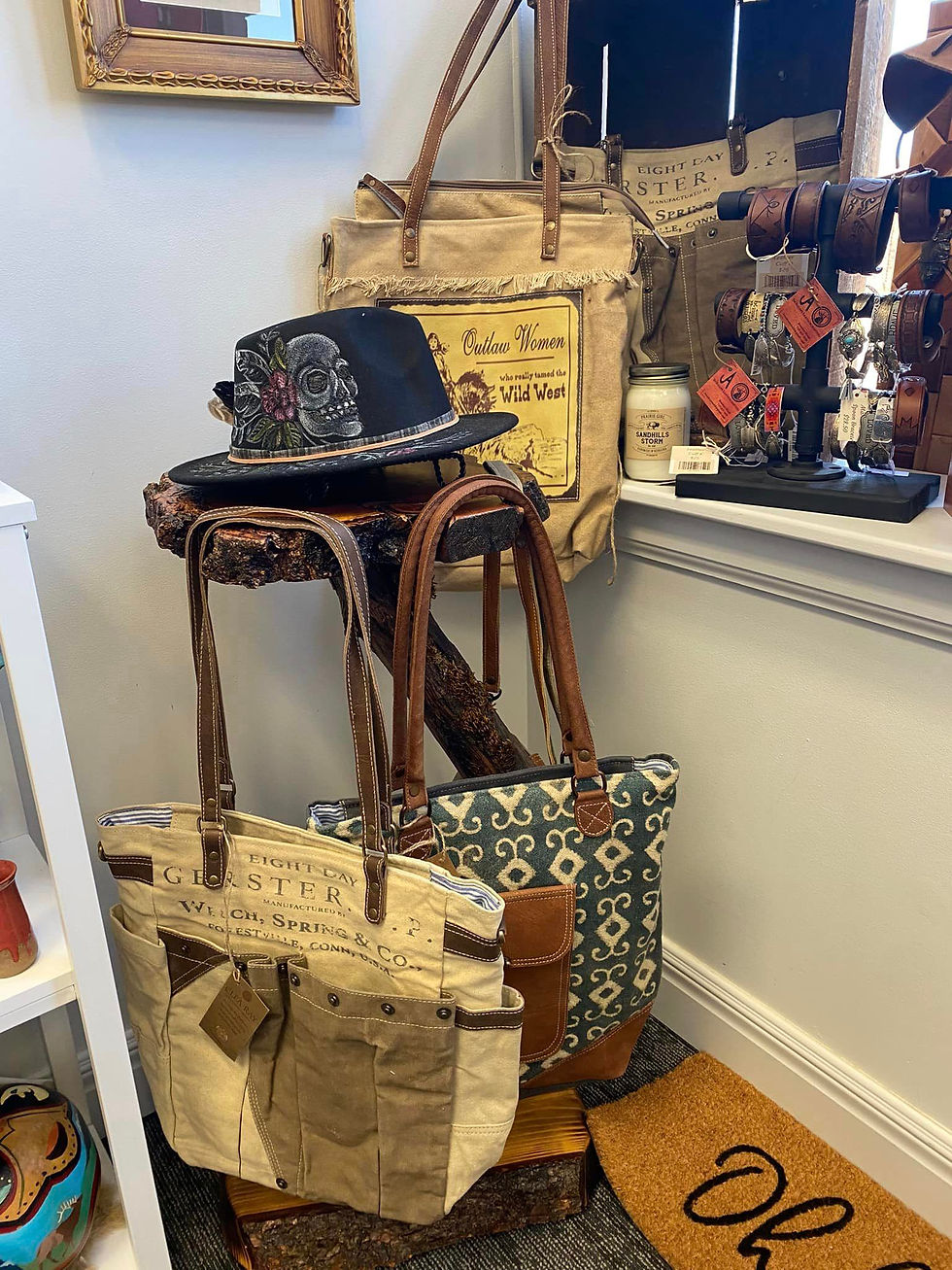 art bags and totes for sale at the wildflower gift shop inside the prairie arts center in north platte nebraska