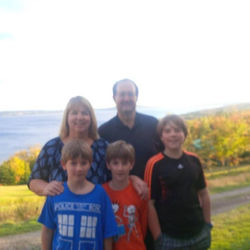 Family on hilltop.