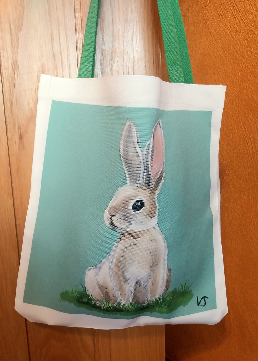 Thumbnail: Rabbit tote bag hanging on door