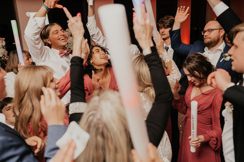 Wedding guests dancing at a Houston wedding reception by D&Co Entertainment