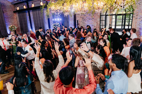 High energy wedding dance floor at a luxury Houston reception by D&Co Entertainment