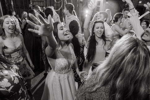 Wedding party and guests dancing at a luxury Houston reception by D&Co Entertainment