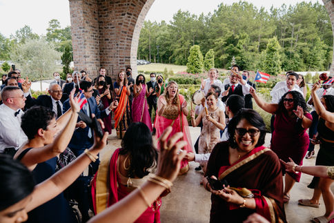 Wedding guests dancing at a Houston wedding reception by D&Co Entertainment