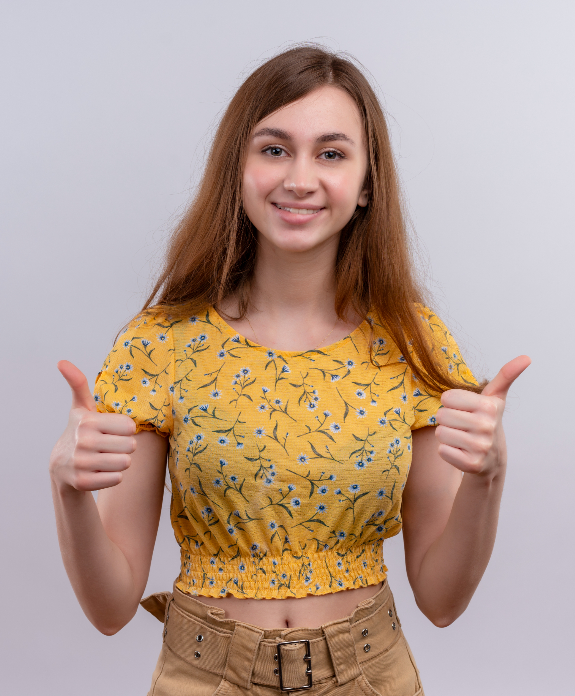 Smiling woman giving thumbs up