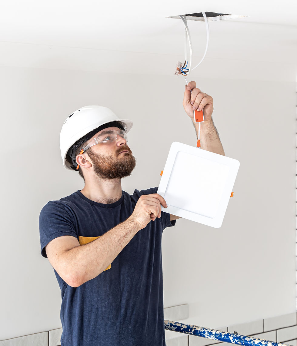 electrician-builder-with-beard-worker-white-helmet-work-installation-lamps-height-professi