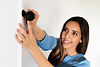 medium-shot-woman-holding-camera.jpg