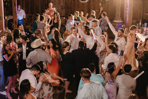 High energy wedding dance floor at a luxury Houston reception by D&Co Entertainment
