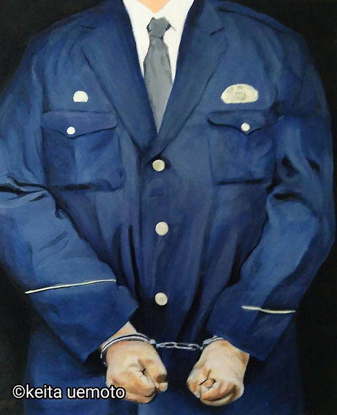 捕まった男
