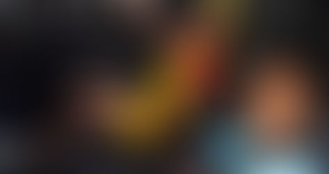 Children sitting safely in the back of a vehicle.