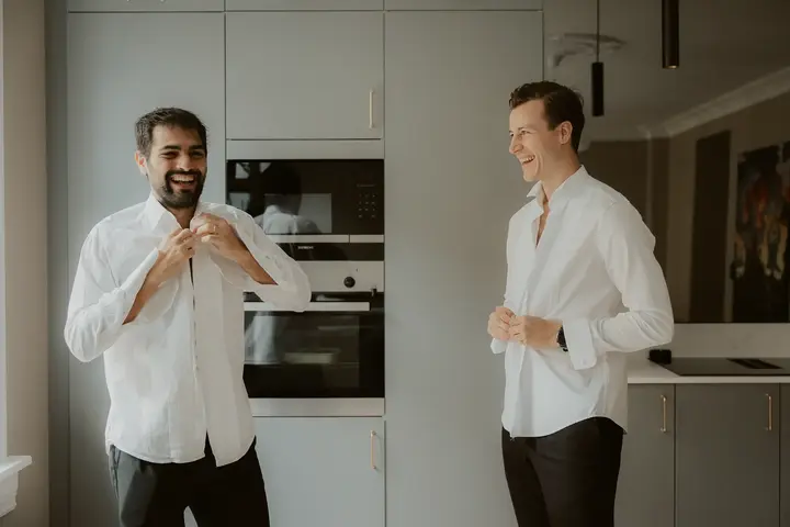 Groom getting ready with best friend in Oslo Norway