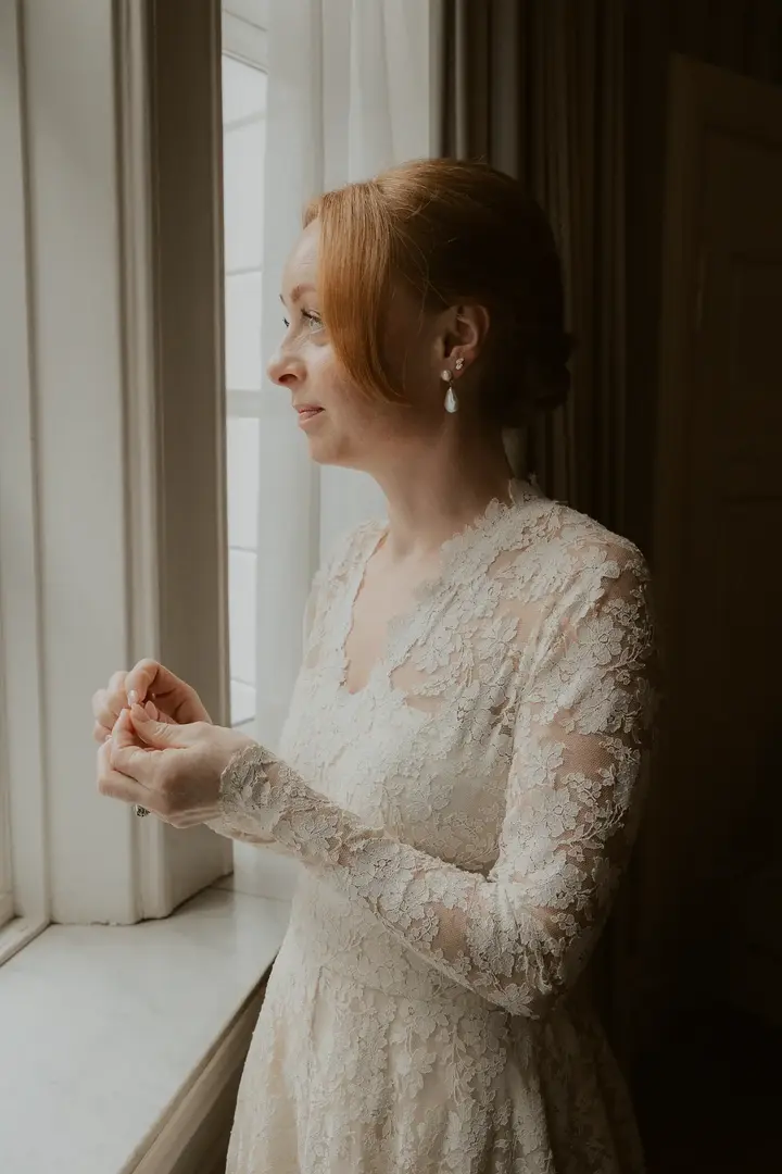 Emotional bride getting ready in Oslo
