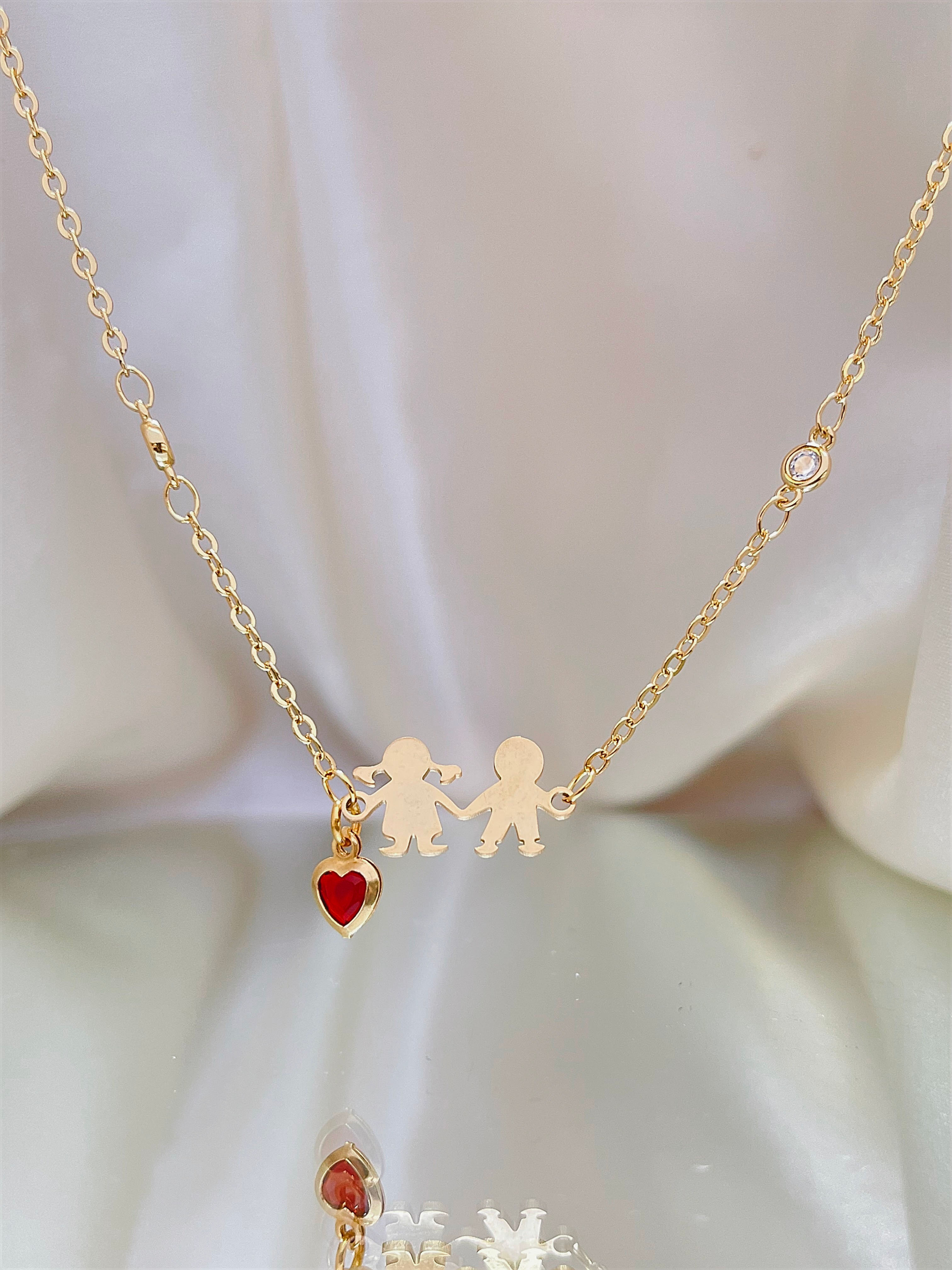 Cadena de acero con dije de oro laminado