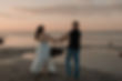 couple spinning holding hands