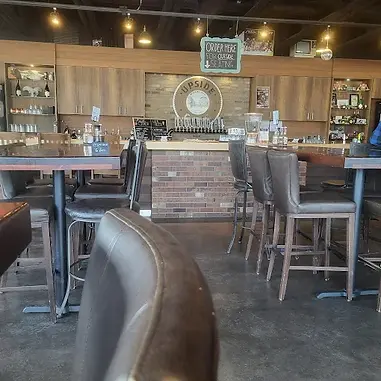 Upside Cider certified organic cider flight and wood-fired pizza in cozy tasting lounge on Gale Road Kelowna BC