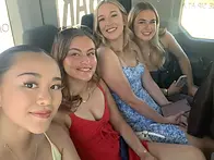 Friends laughing and celebrating on a private Kelowna wine tour with BARE Wine Tours