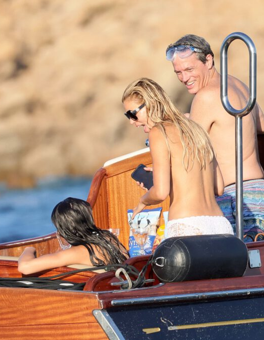 Brooks Nader sighted topless on a yacht during family vacation in Sardinia