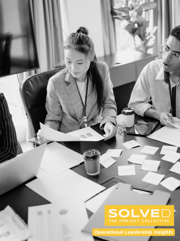 Image representing professionals discussing workflow, symbolizing the complexity of supply chain and the need for operational leadership grounded in real-world experience.