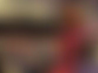 Businesswoman presenting to large business audience.