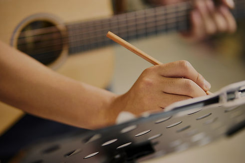 Guitarist Writing Song_edited_edited.jpg