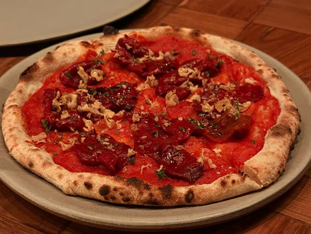 Pizza de calahorras at Anchoita restaurant Buenos Aires, wood-fired with roasted sweet Calahorra peppers