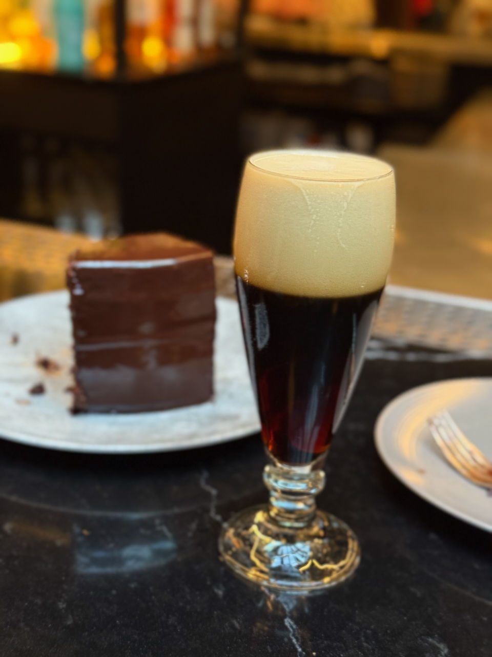 Nitro Caramelized Chocolate Churro Porter poured at Moody Tongue brewery in Chicago.