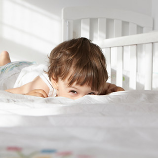 Boy on a Bed