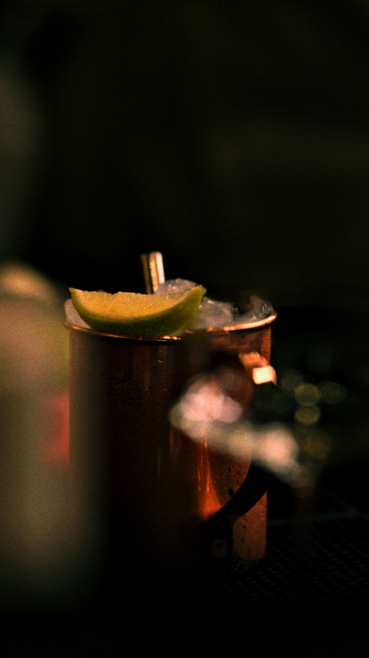 Moscow Mule in a copper mug with a lime wedge garnish
