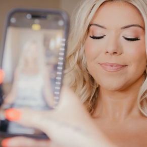 bride smiling for selfie