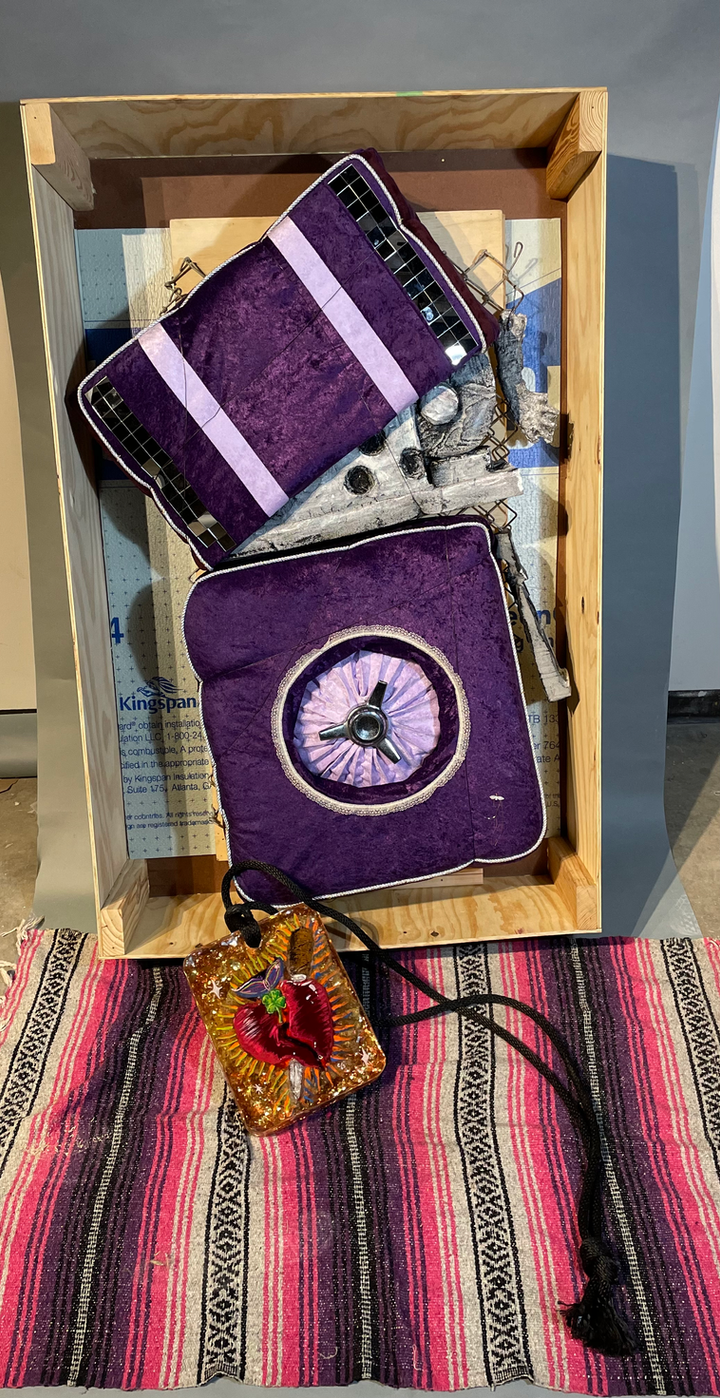 Alameda st. Couch Cushions,
Buried fence, Siding foam, Velvet, mirrors, Cast Paper, Resin, Acrylic Paint, Silver Cording, One Serape, Shipping Container, One Milagro de Ojos
