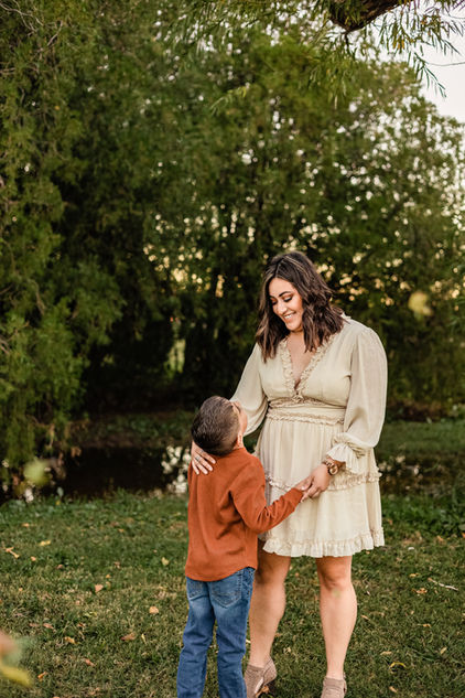 Mother looking lovingly at her small son. 