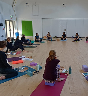 women sitting in a circle attending a Menopause Yoga workshop