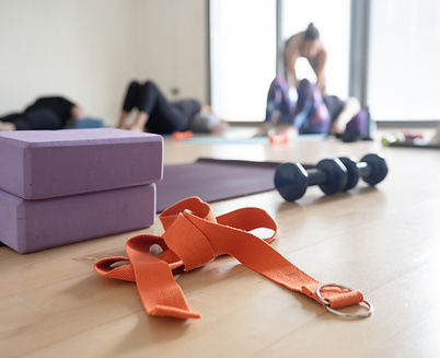 Yoga with dumbbells and elastic bands