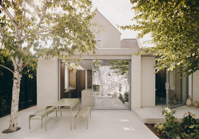 London Extension, Bricks and Concrete Rear extension, Bricks, concrete, long format bricks, architecture, residential architecture, extension garden, listed building, historic building, large modern glazing, concrete floor, pivot door, sliding doors. contemporary architecture