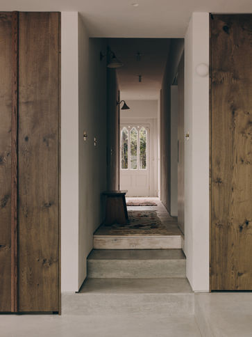 Hallway, old meets new, Old meets new, residential architecture, beautiful architecture, concrete steps, sanded pine floor, kabric walls, plaster walls, shadow gap, timber joinery, oak joinery, Detale CPH