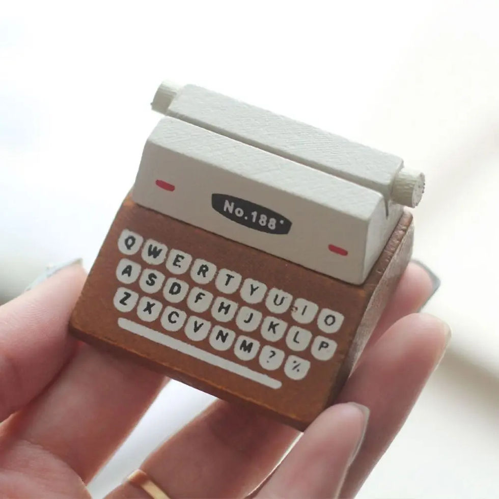 Thumbnail: poulain mini typewriter note holder