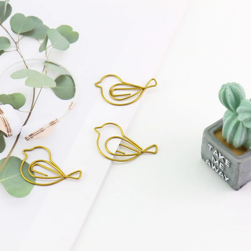 gold bird paper clips